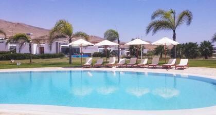 Beach House Condominium Playa Coral 4 km before the boulebard of Asia