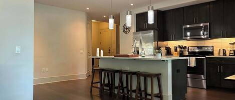Coffee/tea maker, fridge, microwave, oven