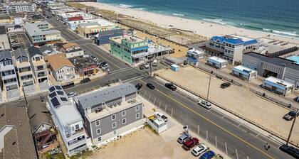 Enjoy a 3-bedroom condo steps to Seaside Heights Boardwalk and Beach and badges!