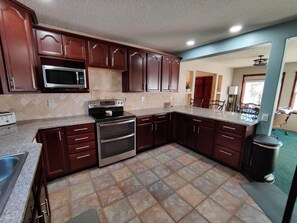 Fridge, microwave, oven, stovetop - Spacious Mountain Home with Hot Tub on 10 Acres, Nearby Skiing (Fairplay)