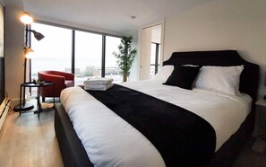 Premium Penthouse, 1 Queen Bed, Balcony, Harbor View | Down comforters, desk, laptop workspace, blackout drapes - Cameo Hotel and Suites (Halifax)