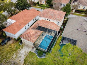 Exterior - Beautiful Reunion Home - 10 mins to Disney South Facing Pool with Tesla Charger (Kissimmee)