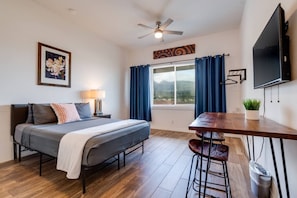 1 bedroom, desk, iron/ironing board, travel cot