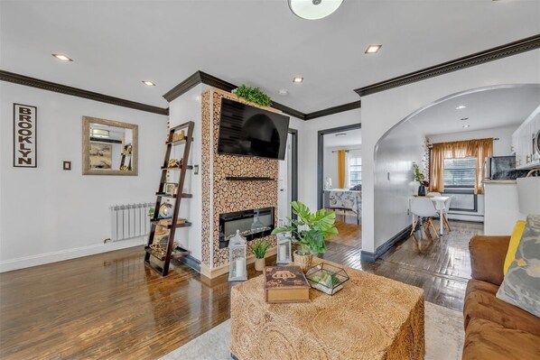 Smart TV, fireplace, books