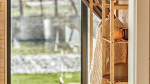 A wooden shelf with a knitted item and a pumpkin. - 2 bedroom cozy home in Trzesacz (Trzesacz)