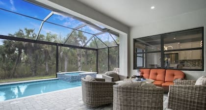 Heated pool, hot tub, outdoor kitchen, privacy, all bedrooms w tv & ceiling fans