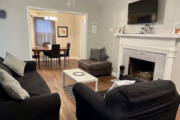 The fireplace is decorative only, & not serviced for use. Large cozy furniture