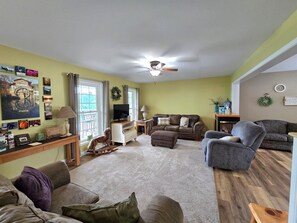 Smart TV, fireplace, foosball, books