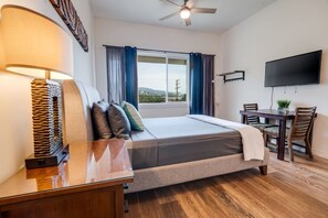 1 bedroom, desk, iron/ironing board, travel crib