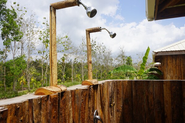 Shower, rainfall showerhead, designer toiletries, hair dryer