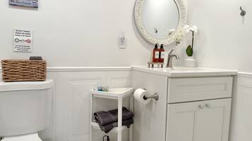 Hair dryer, towels, soap, shampoo