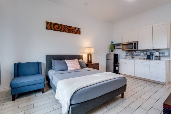 1 bedroom, desk, iron/ironing board, travel crib