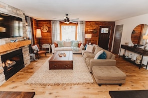 Smart TV, fireplace, DVD player, books