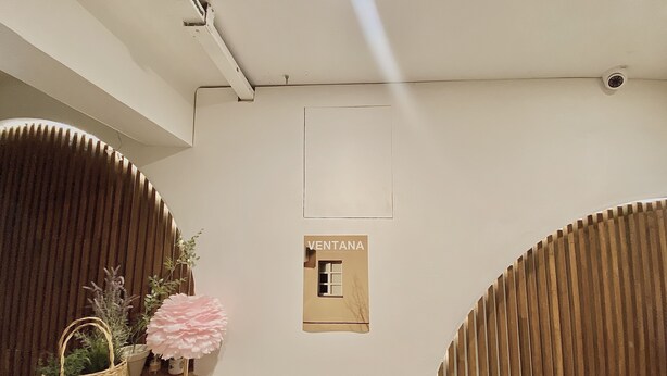 A reception area with a wooden reception desk, a potted plant, and a sign that reads "VENTANA". - Maison Yongsan Hotel (Seoul)
