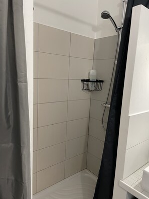 Chuveiro, secador de cabelo