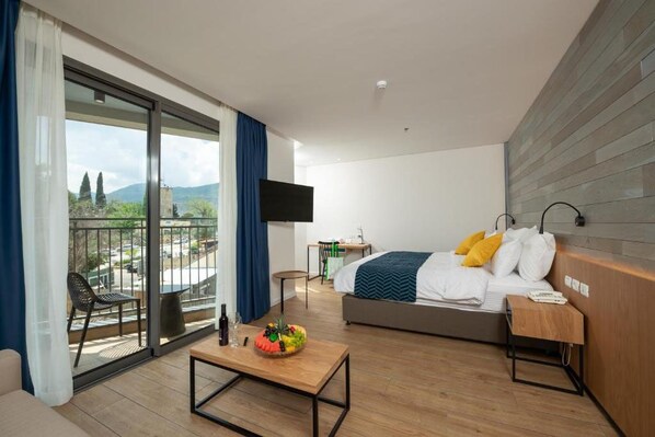 Habitación cuádruple Confort | Caja de seguridad en la habitación y tabla de planchar con plancha 