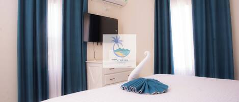 2 عدّة غرف نوم ومكواة/لوح كي وواي فاي مجانًا وملاءات أسرّة