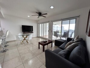 Costa Veleros 61 | Living room | 50-inch plasma TV with digital channels, TV - Costa Veleros Apartments (Mazatlán)
