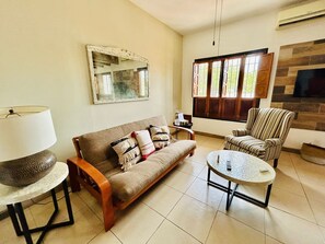 Comfort Apartment, 1 Queen Bed | Living area | 50-inch plasma TV with digital channels, TV - Meson del Capitan Apartments (Mazatlán)