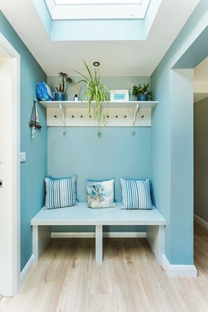 A room with a bench, a ceiling light, and a shelf with plants and a framed item. - 5-star rural escape hidden between the coastal towns of Kinsale and Clonakilty, (Clonakilty)