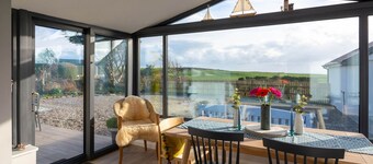 A perfectly reclaimed cottage with uninterrupted views of the Atlantic Ocean....