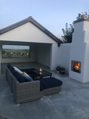Terrace/patio - A perfectly reclaimed cottage with uninterrupted views of the Atlantic Ocean.... (Clonakilty)