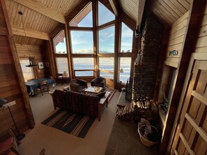 Smart TV, fireplace, books, computer monitors