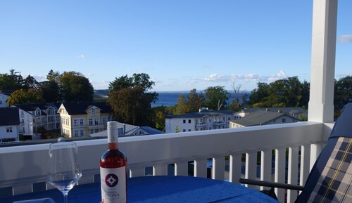 Vacation apartment evening meal with sea view