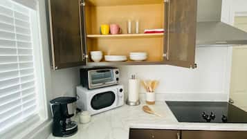 Fridge, microwave, stovetop, coffee/tea maker