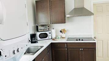 Fridge, microwave, stovetop, coffee/tea maker