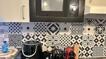Refrigerador, microondas, parrilla de estufa y lavavajillas