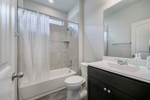 Shower, towels, soap, toilet paper