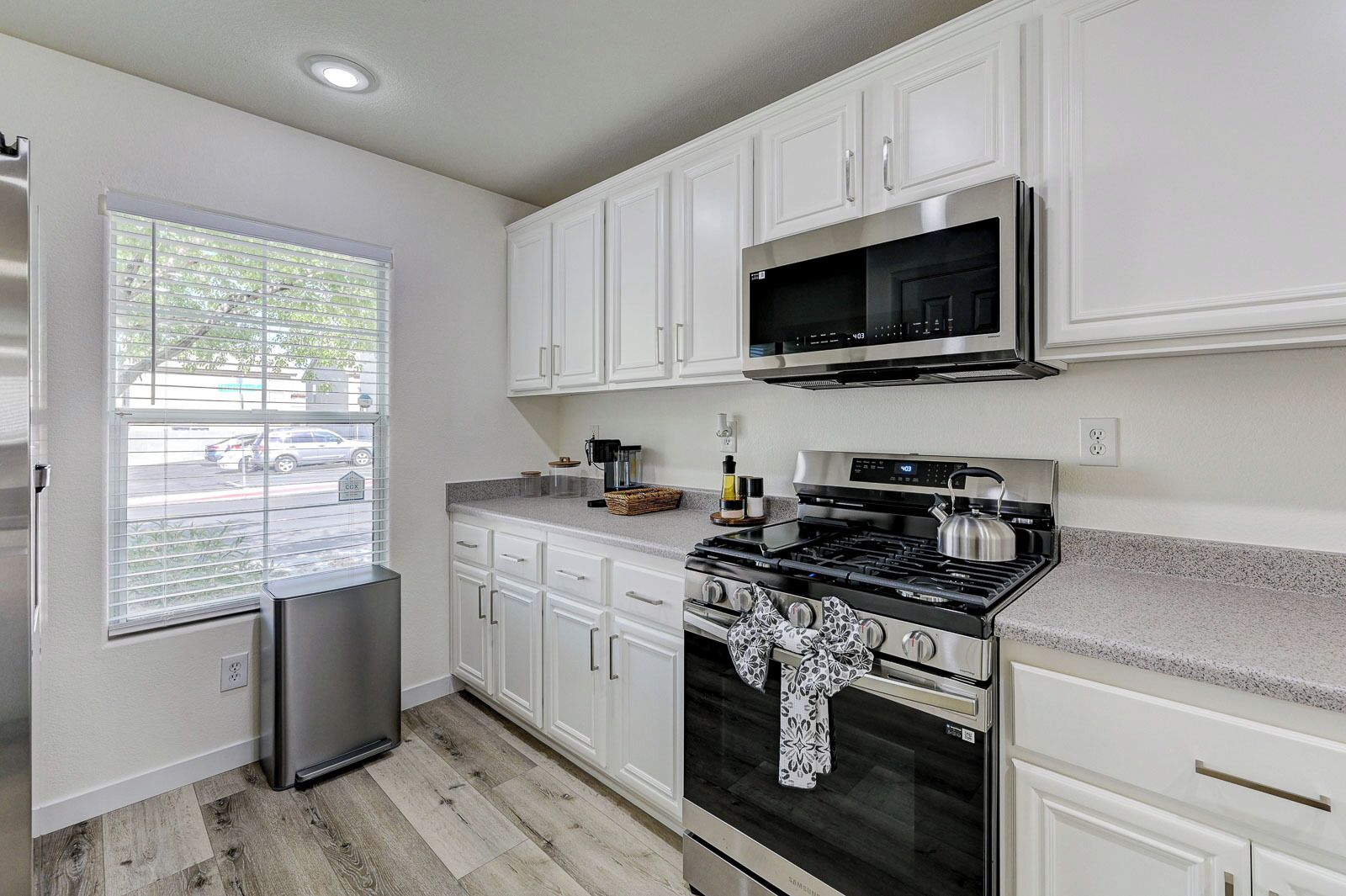 Microwave, dishwasher, dining tables