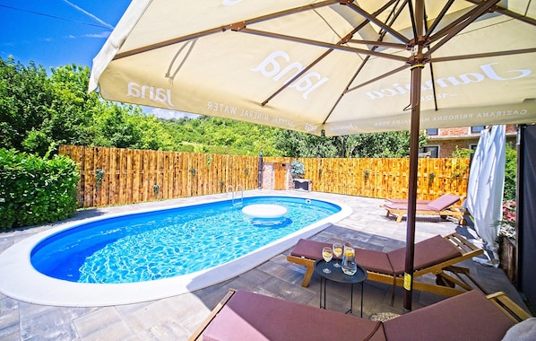 Outdoor pool, sun loungers