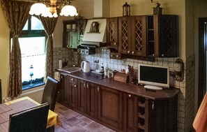 Microwave, stovetop, coffee/tea maker, cookware/dishes/utensils