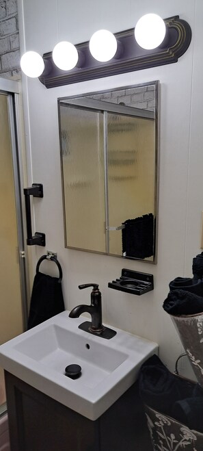 Hair dryer, towels, soap, shampoo
