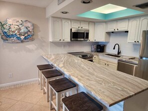 Fridge, microwave, oven, stovetop - Magnificent comfortable 3rd floor ocean view/beachfront condo (Stuart)