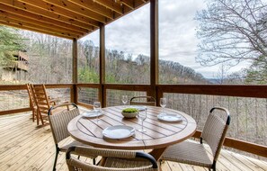 Outdoor dining - New Luxury Indoor Pool cabin w/ Sunset Mnt view! Hot tub, game room, location!  (Sevierville)