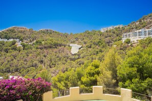 A hillside view with buildings, trees, and a pool. - CostaBlancaDreams - Casa Altea in Altea (Altea)