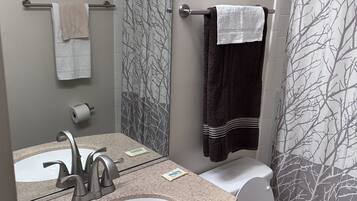 Shower, towels, soap, shampoo