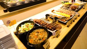A buffet with various dishes including salads, soups, and skewers. - OnnNakatsugawa (Nakatsugawa)