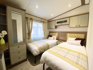 3 quartos, ferros/tábuas de passar roupa, Wi-Fi, roupa de cama