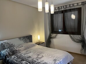 2 dormitorios, tabla de planchar con plancha, wifi y ropa de cama