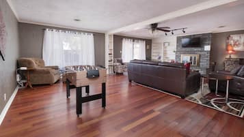 Smart TV, fireplace, table tennis, books
