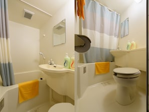 Basic-Doppelzimmer, 1 großes Einzelbett, Nichtraucher | Badezimmer | Duschwanne, kostenlose Toilettenartikel, Haartrockner, Hausschuhe