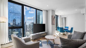 Three Bedroom Two Bathroom Apartment | Living area | 50-inch LCD TV with digital channels, TV