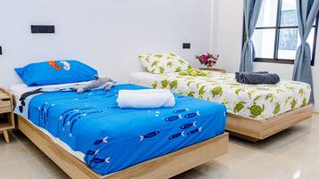 Basic Twin Room | Desk, laptop workspace, free WiFi, bed sheets