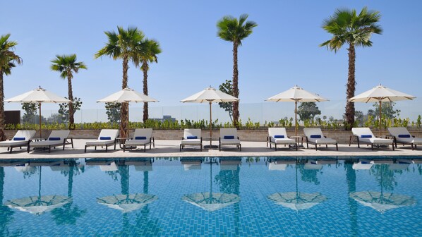 Outdoor pool, sun loungers - InterContinental Residences Abu Dhabi by IHG (Abu Dhabi)