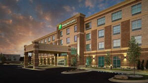 A Holiday Inn Express hotel with a brick facade, multiple windows, and a covered entrance. - Holiday Inn Express Jackson - Ridgeland by IHG (Ridgeland)