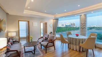 Presidential Suite | Living area | 40-inch Smart TV with digital channels, TV